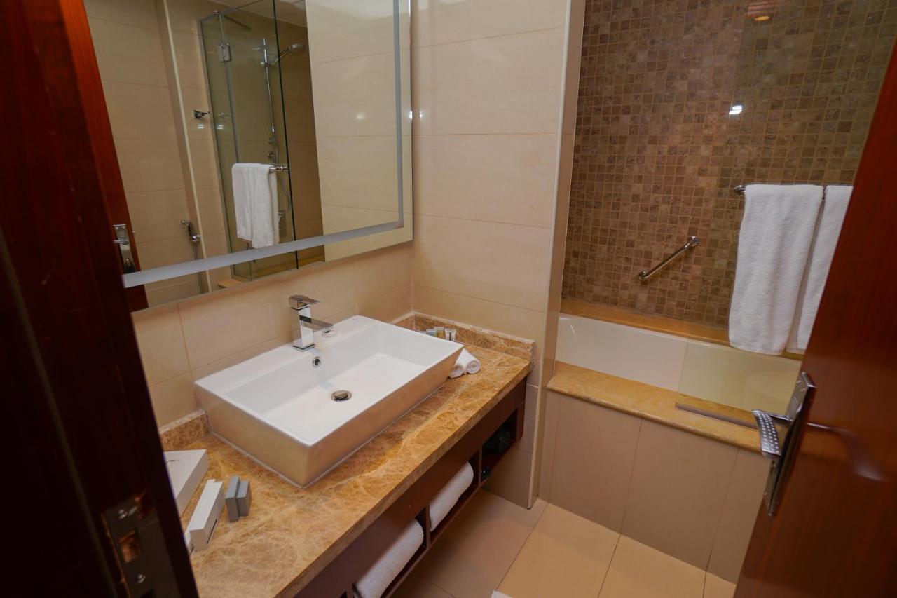 The Grand Lux Hotel Doha Exterior photo Bathroom