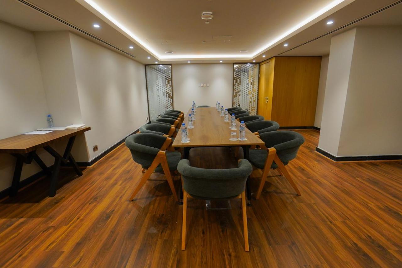 The Grand Lux Hotel Doha Exterior photo Meeting room at the hotel