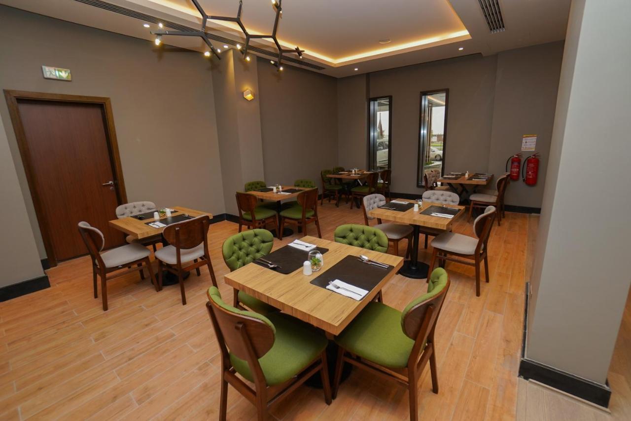 The Grand Lux Hotel Doha Exterior photo The restaurant