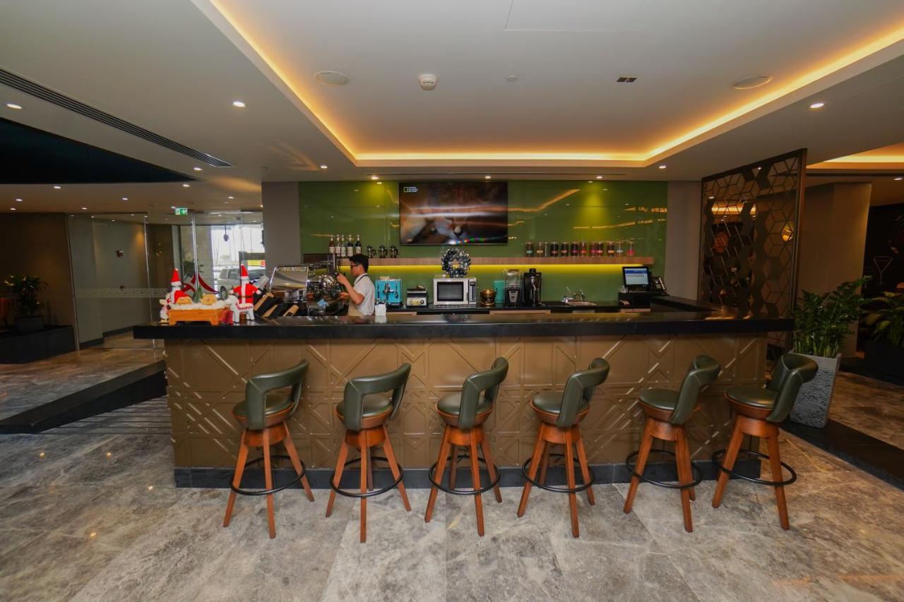 The Grand Lux Hotel Doha Exterior photo The bar at the lounge