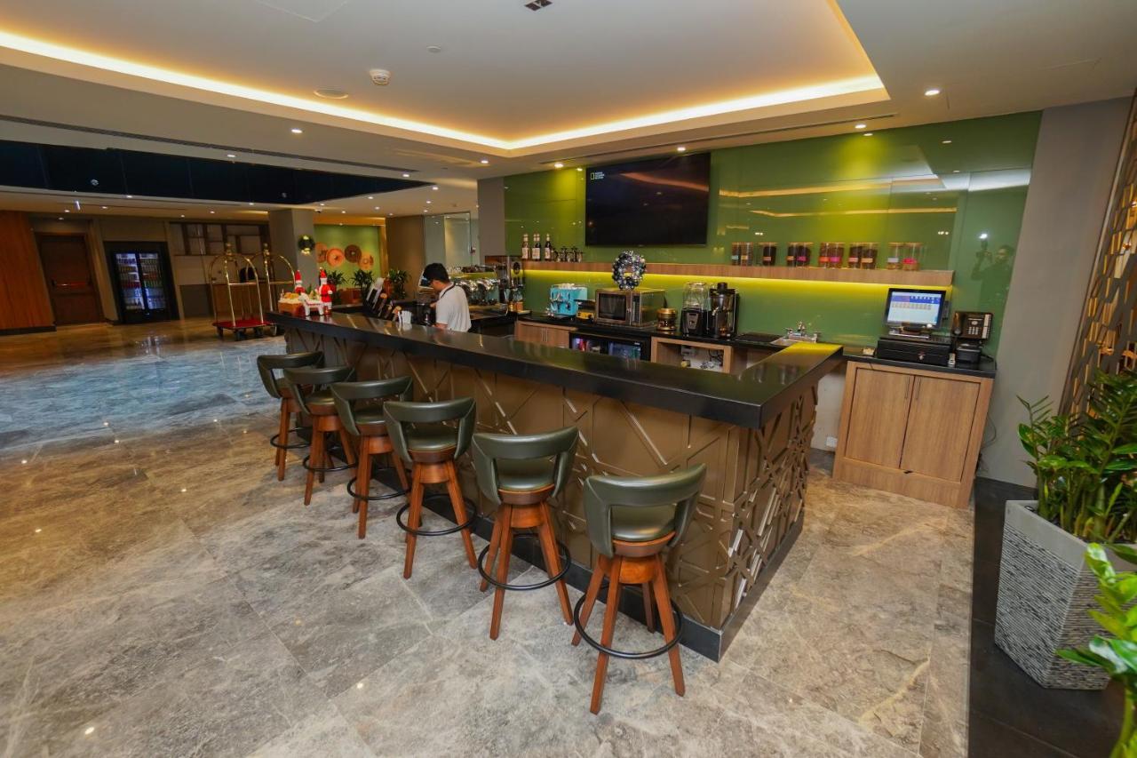 The Grand Lux Hotel Doha Exterior photo The bar at the lounge