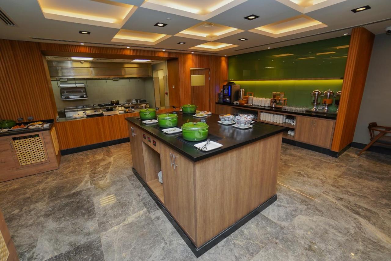 The Grand Lux Hotel Doha Exterior photo The kitchen at the Royal Brunei Airlines VIP Lounge at Brunei International Airport